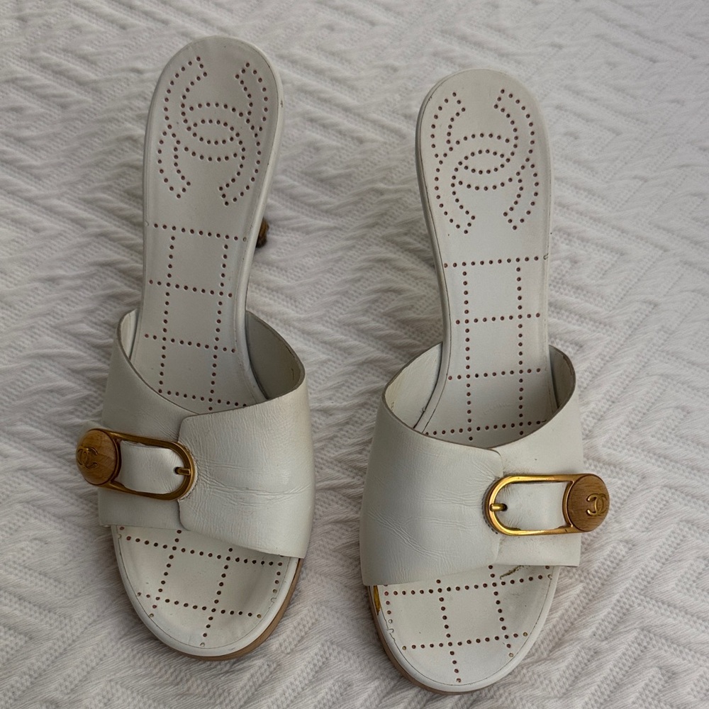 CHANEL White Leather Mules with Gold Buckle